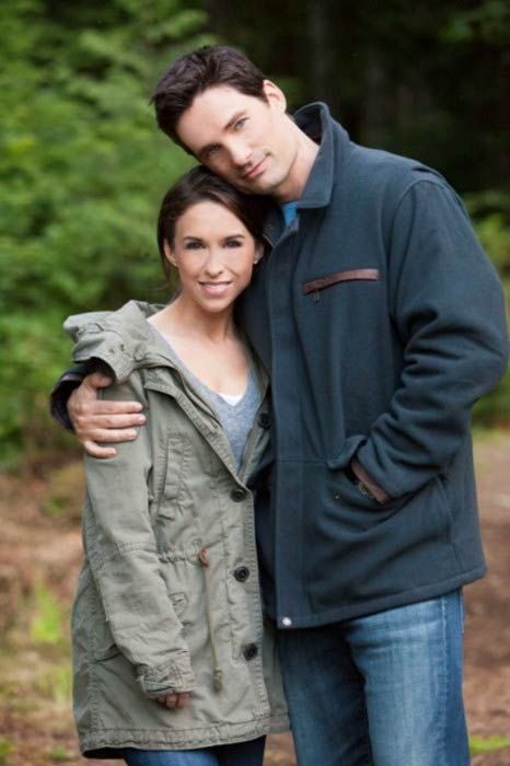 David Nehdar and Lacey Chabert taking a picture together.